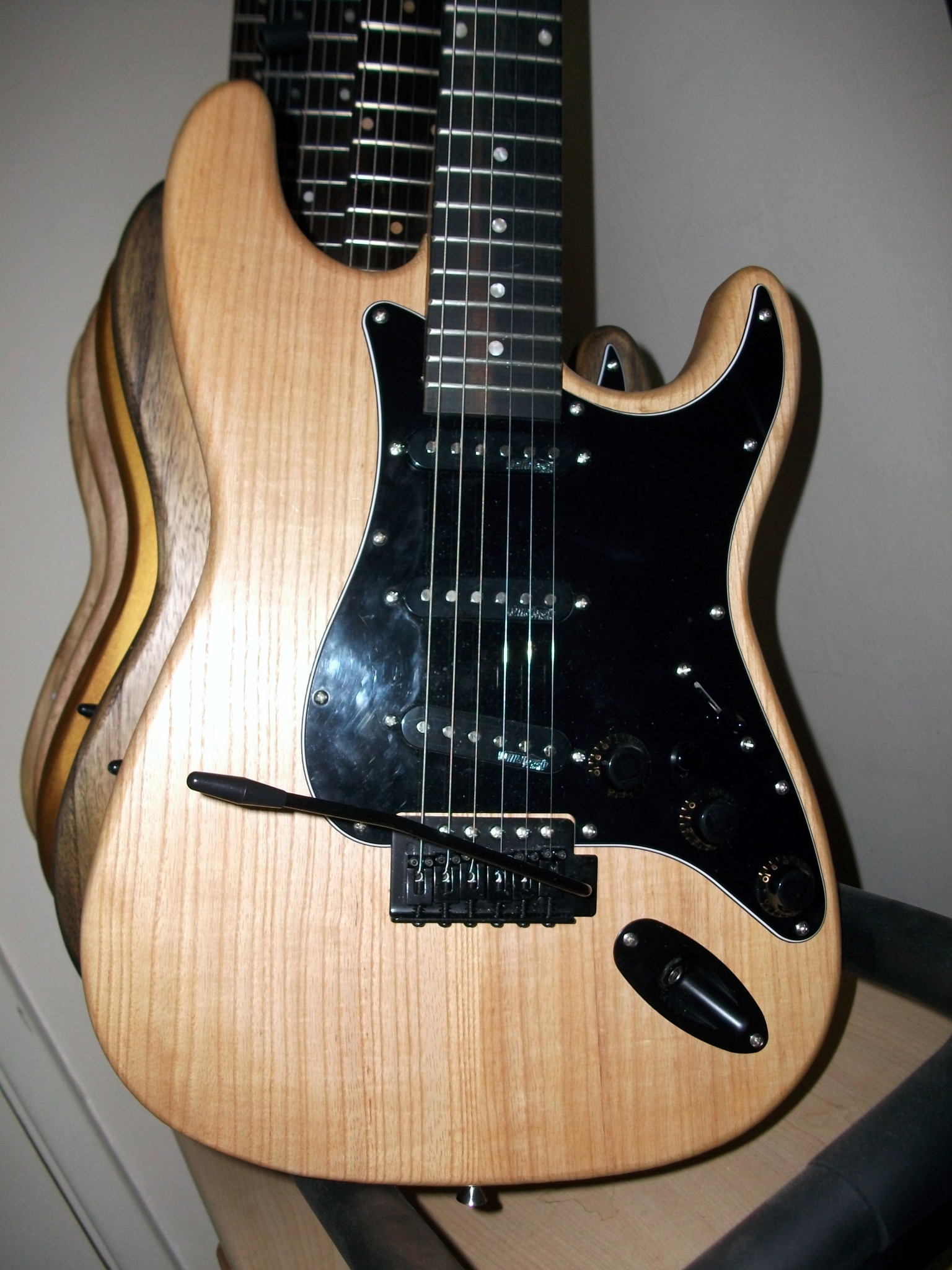Close-up detail of a bespoke electric guitar